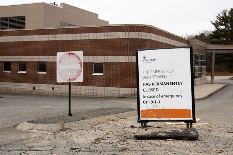 a sign noting the hospital is permanently closed