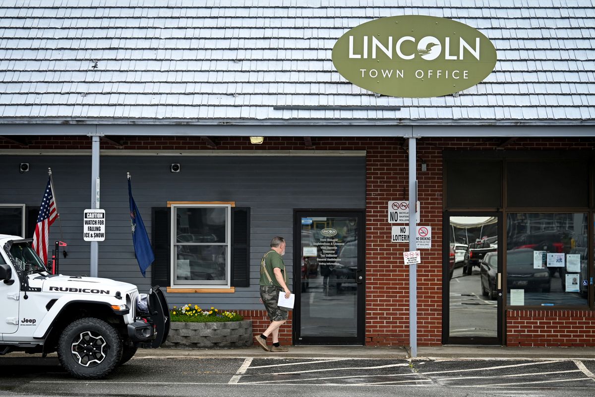 a man walks into the lincoln town office
