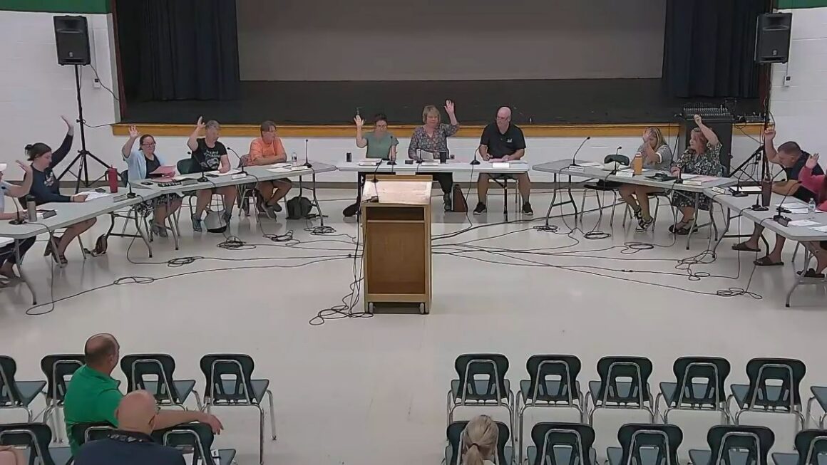 Members of the RSU 73 board during a meeting.