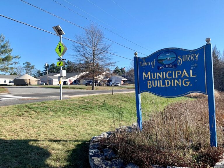 a sign for the town of surry municipal building.