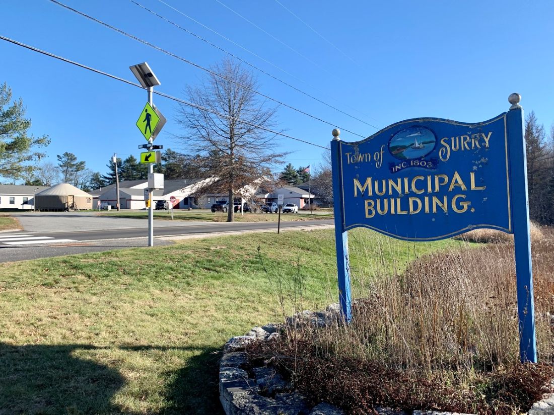 a sign for the town of surry municipal building.