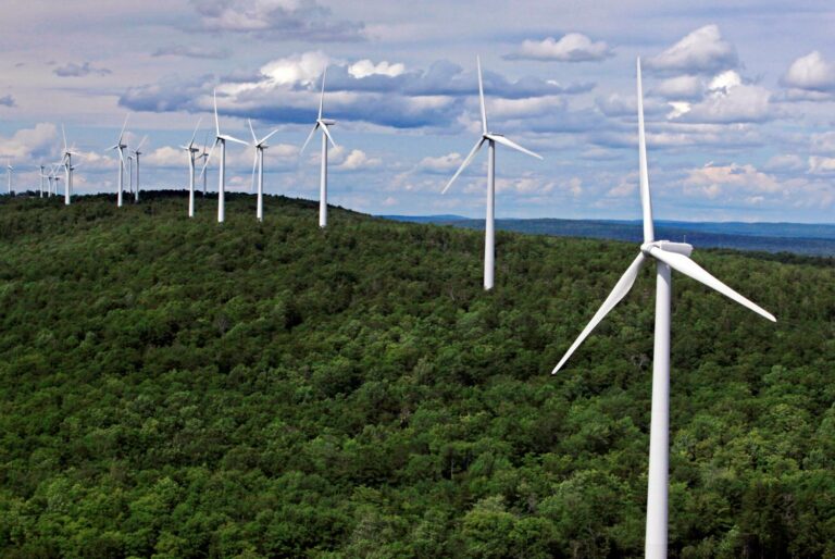wind turbines line a ridge on Stetson Mountain