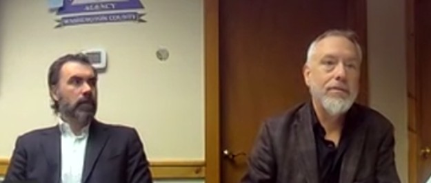 two members of the budget panel seen during a meeting