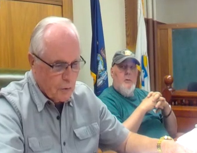 David Burns and Billy Howard during a meeting.