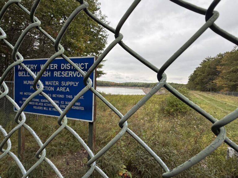 the kittery water district facility seen behind a chain-linked fence