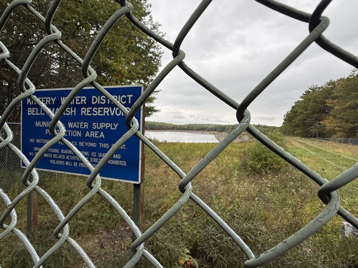 the kittery water district facility seen behind a chain-linked fence