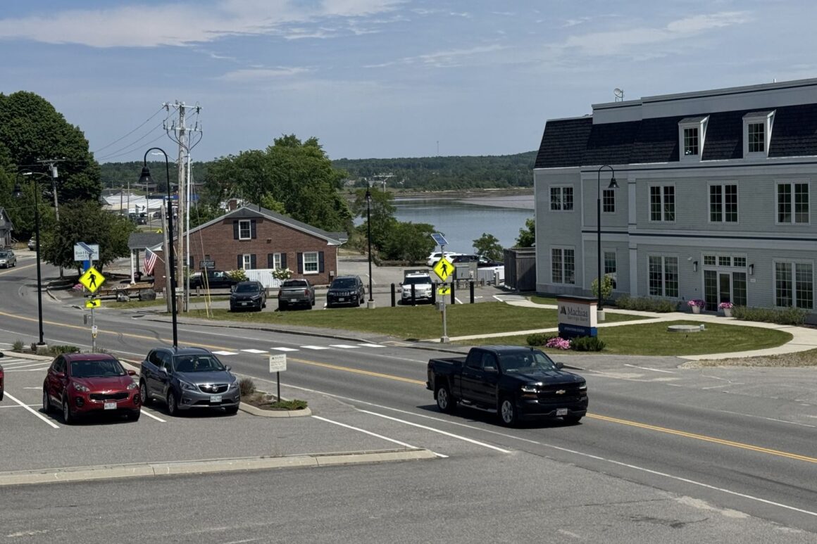 buildings line the side of downtown machias